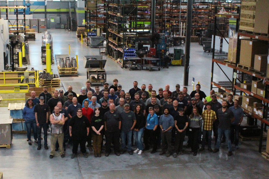 Kryton employees posing in warehouse for a group shot!